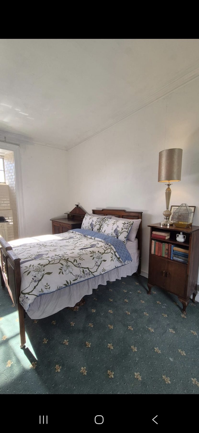 Guest bedroom at Kyle Park Estate with valley views